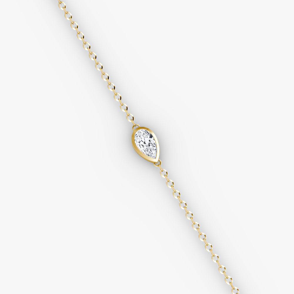 Bezel-Set Pear Diamond Pendant Bracelet in Yellow Gold (1.10 CT, E/VS1